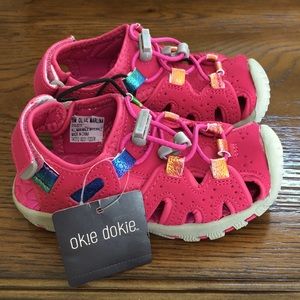 New toddler girls pink Okie Dokie shoes.  Size 8.  Metallic colors as accents.